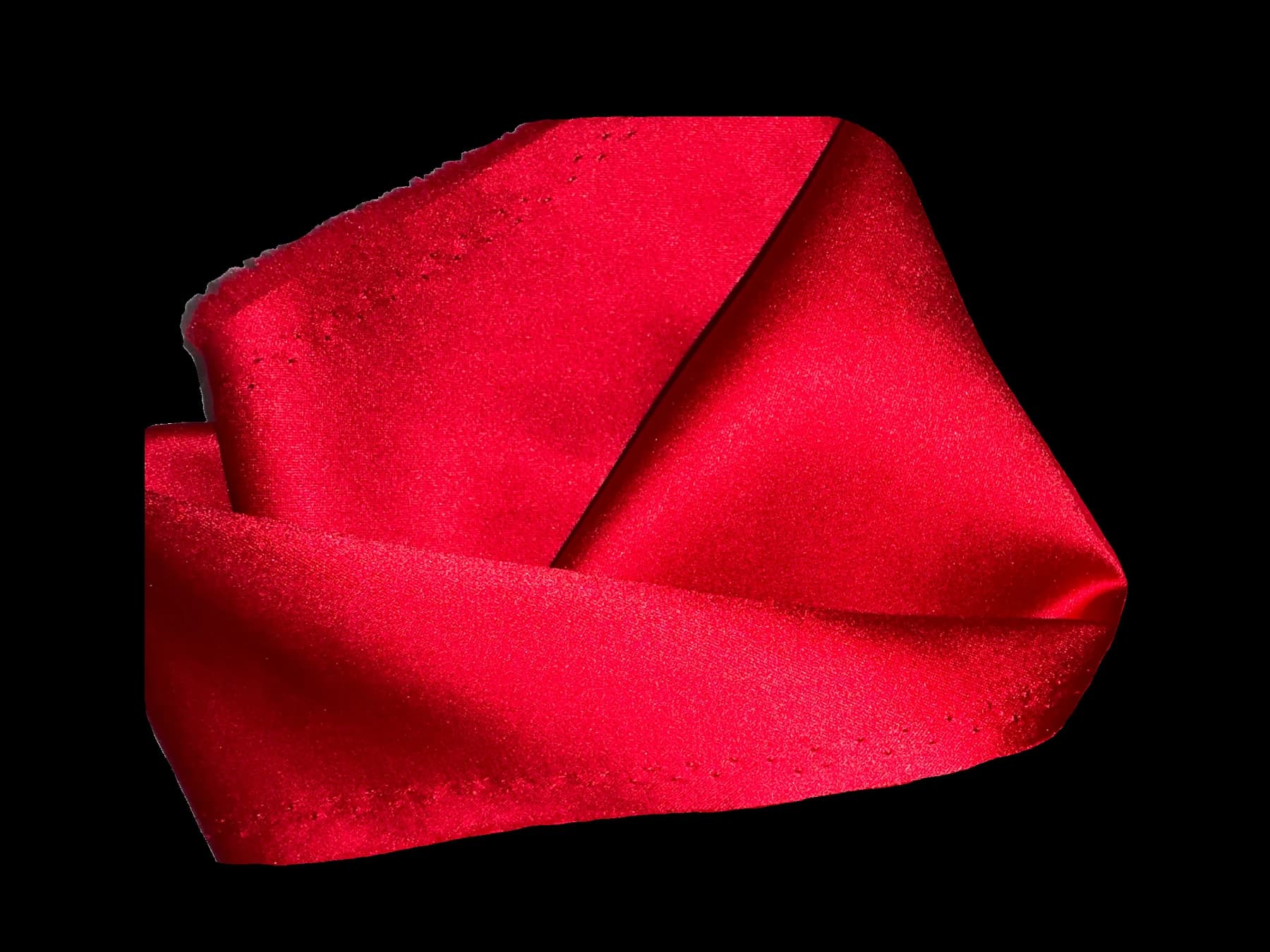 Folded red textile selected for the Passion project.